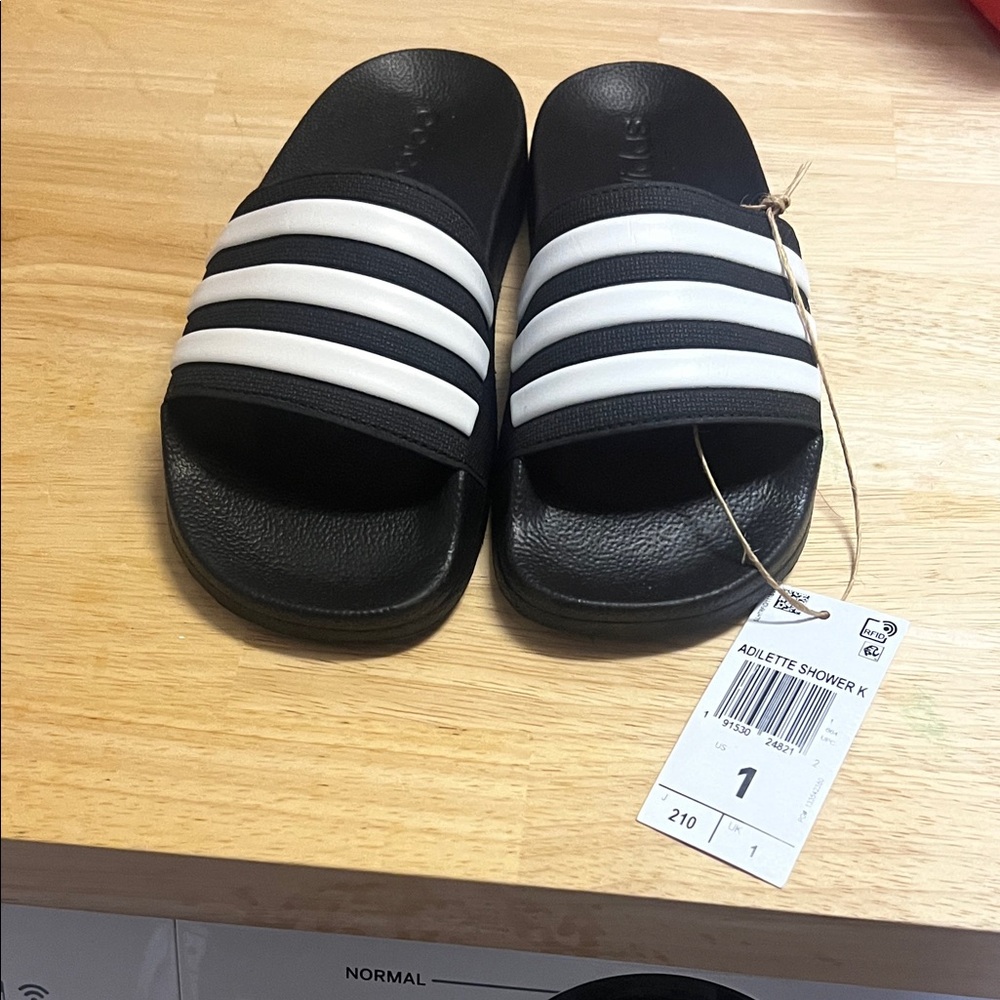 Adidas Black Slides with White Stripes